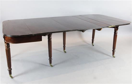 A Regency mahogany concertina action extending dining table, Extended W.3ft 9in. D.7ft 2in. H.2ft 4in.